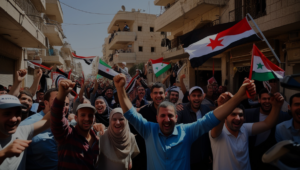 A crowd of Syrian citizens celebrating in the streets of a rebel-controlled area in Damascus